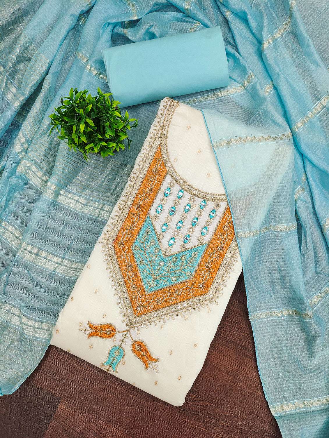 women self design unstitched suit set