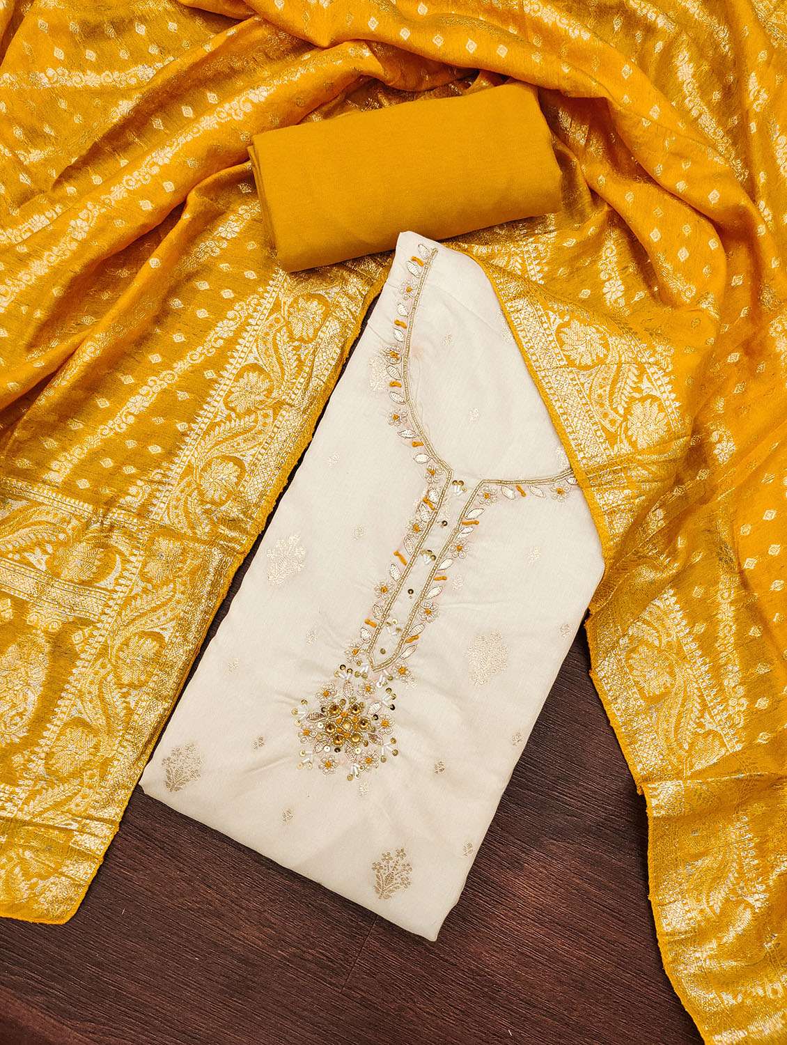 women self design unstitched suit set