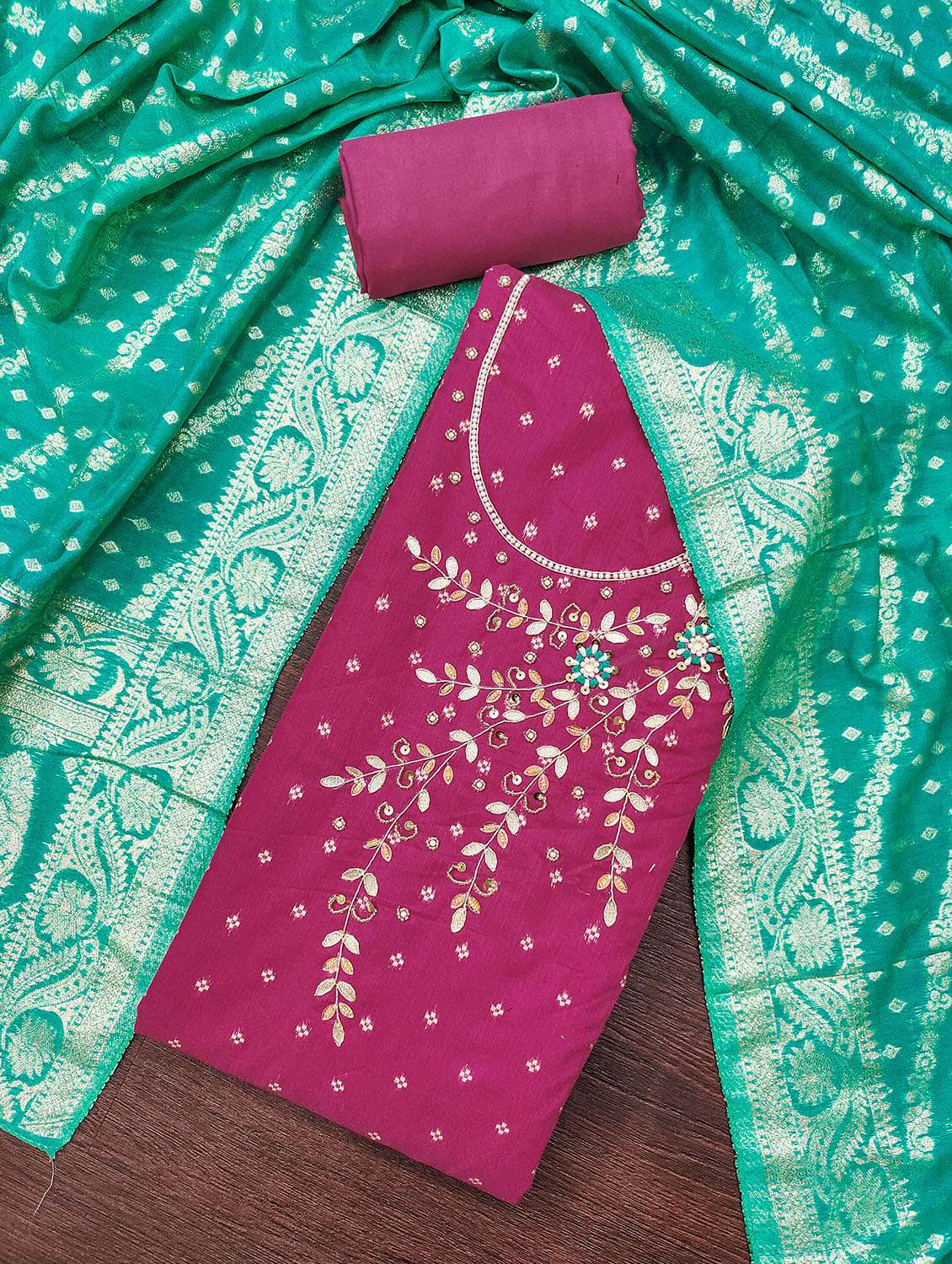 women self design unstitched suit set