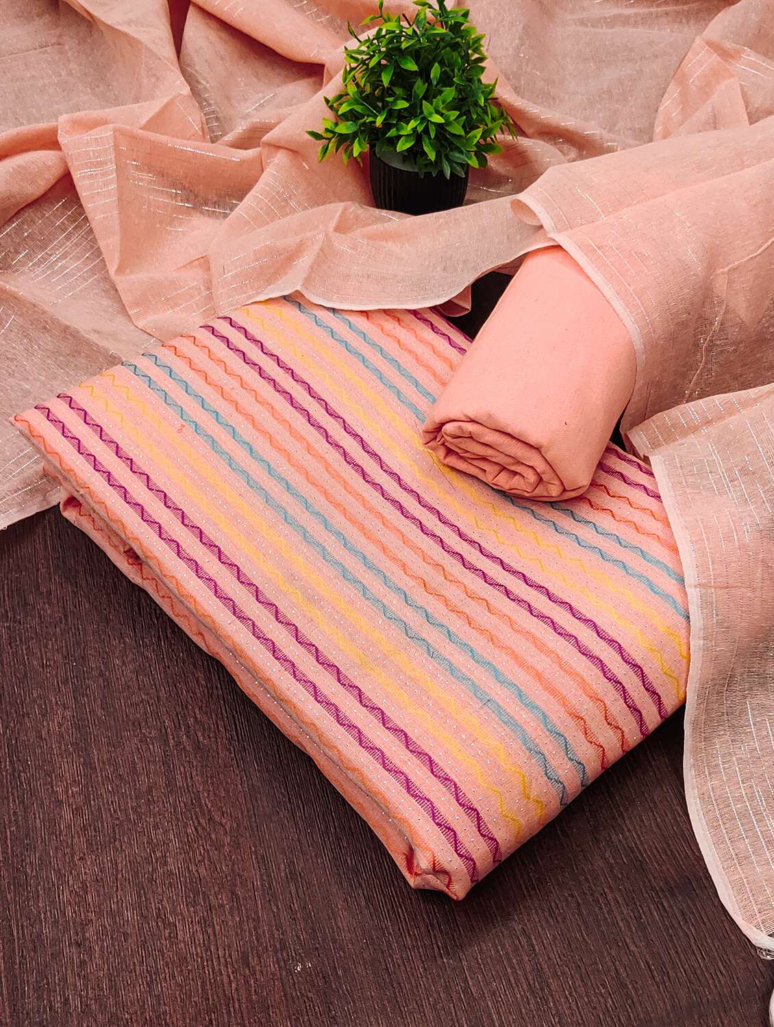 women self design unstitched suit set