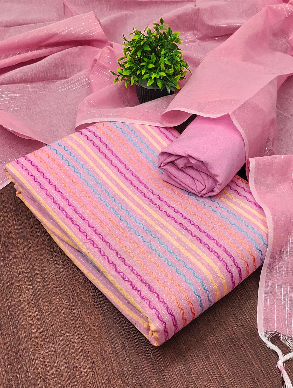 women self design unstitched suit set