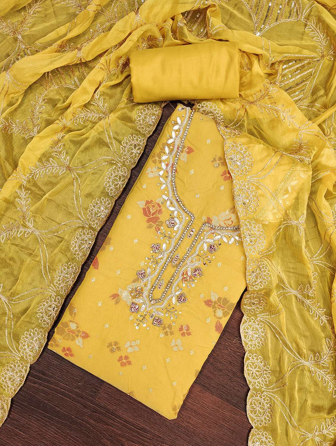 women self design unstitched suit set