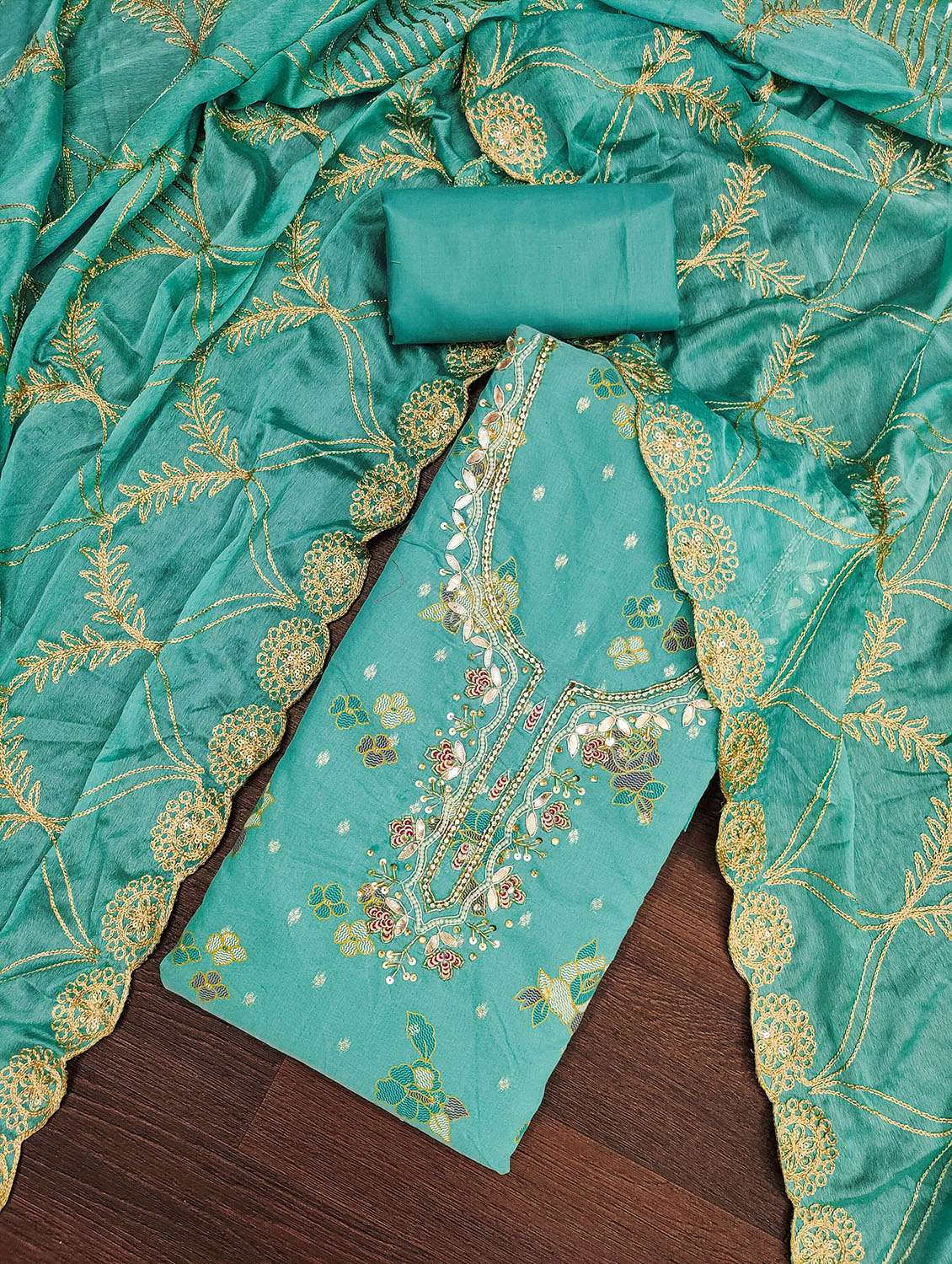 women self design unstitched suit set