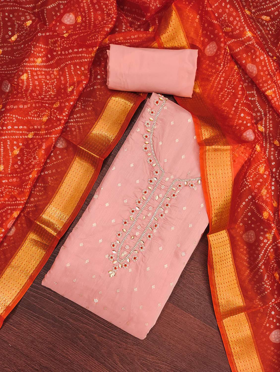 women self design unstitched suit set