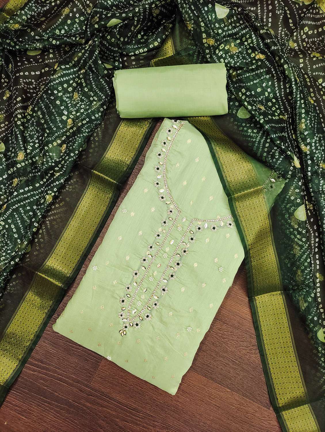 women self design unstitched suit set