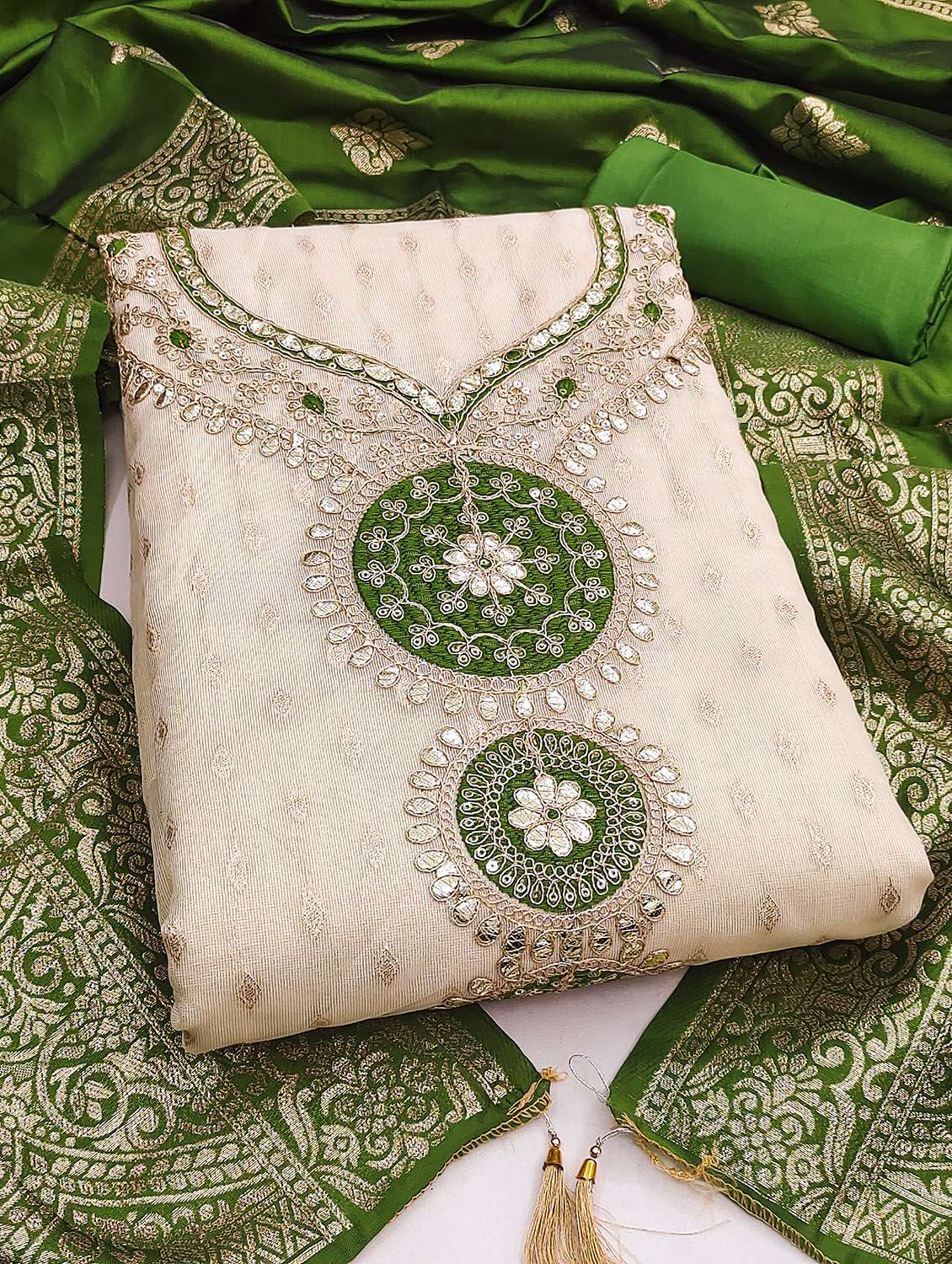 women self design unstitched suit set