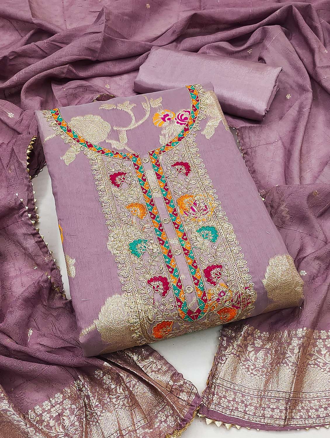women self design unstitched suit set