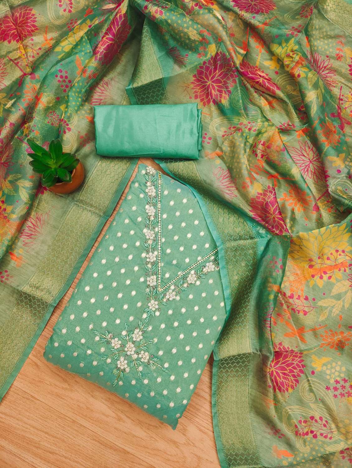 women self design unstitched suit set