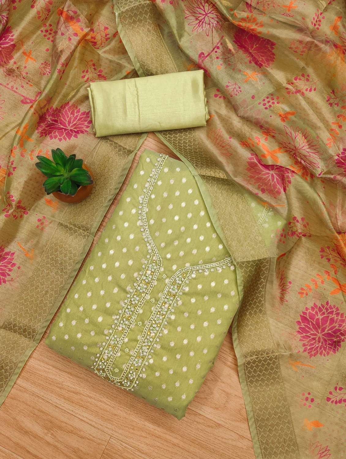 women self design unstitched suit set