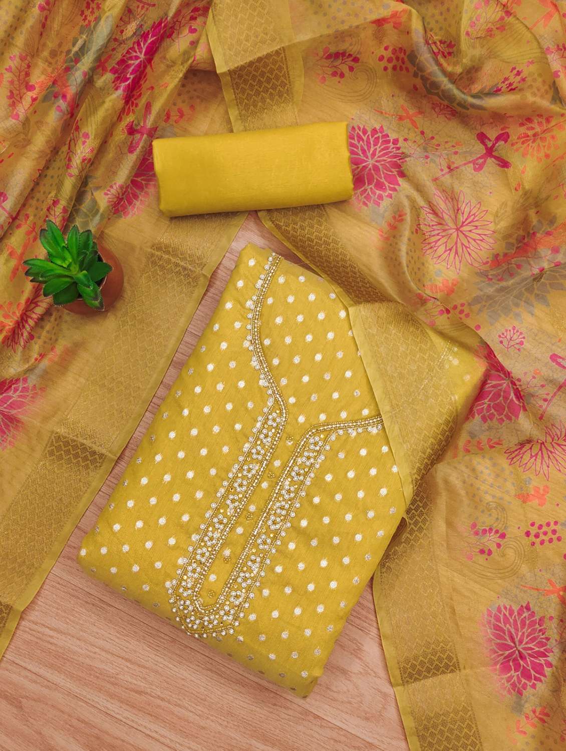 women self design unstitched suit set