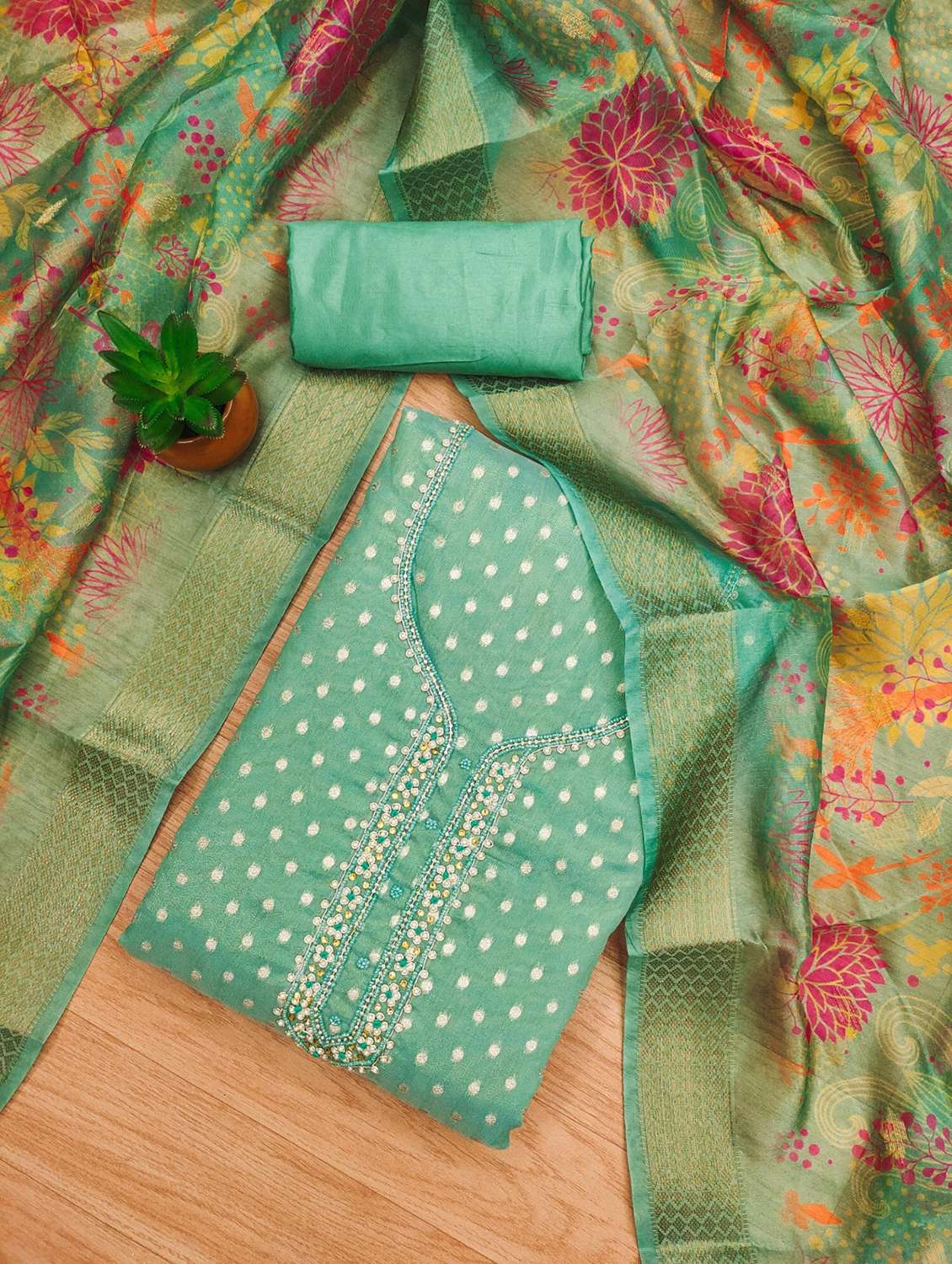 women self design unstitched suit set