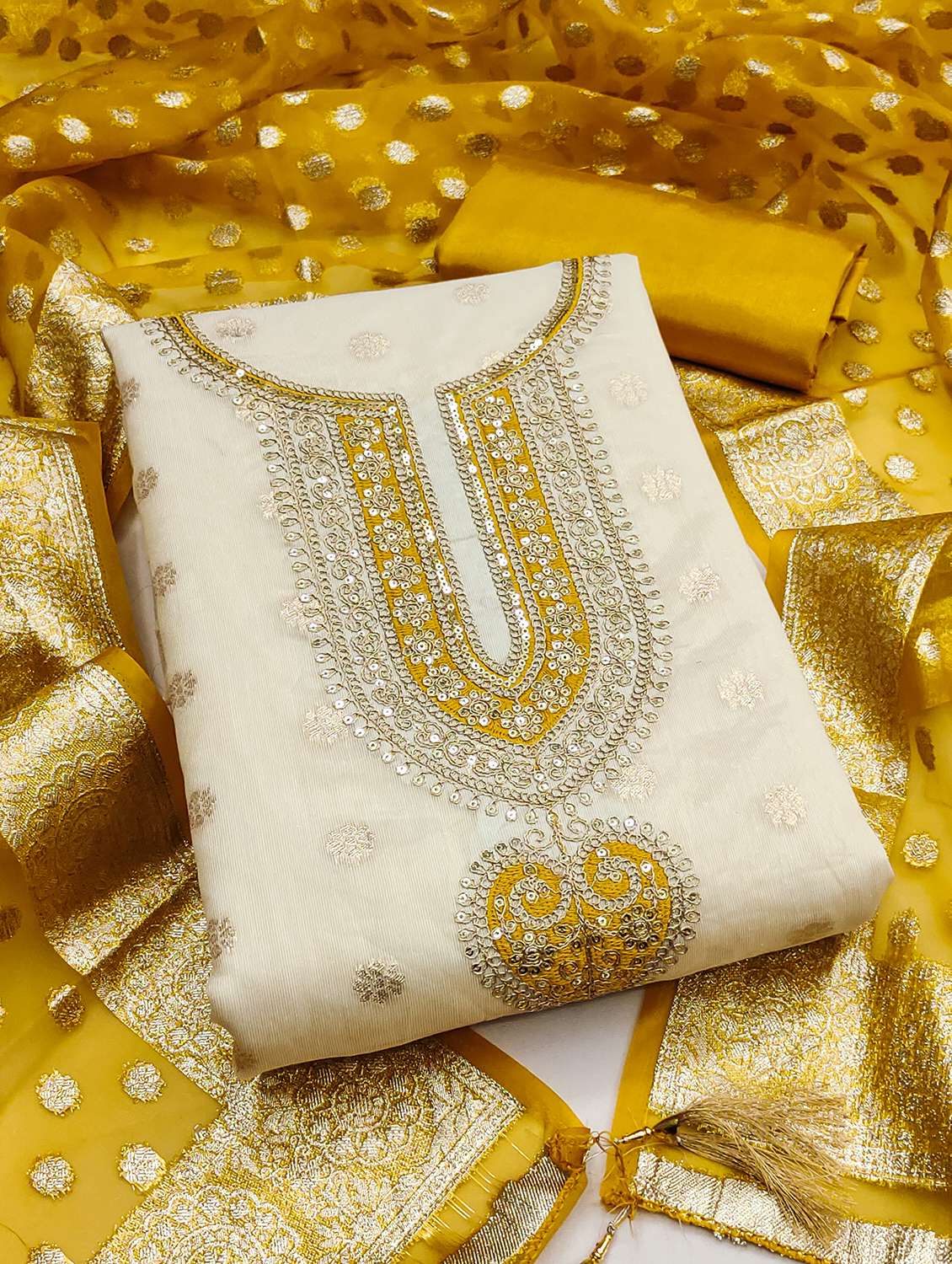 women self design unstitched suit set