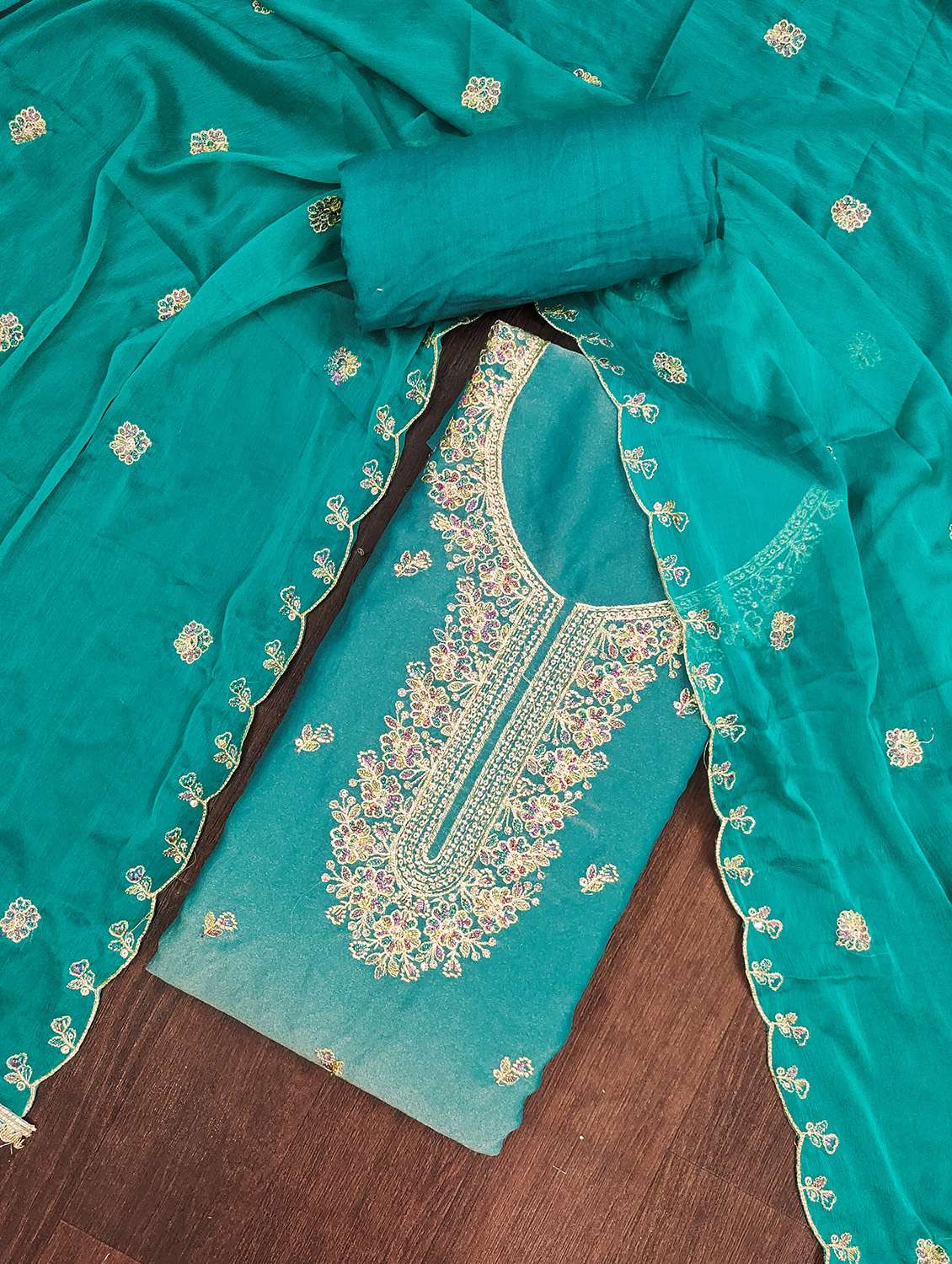 women solid with work unstitched suit set