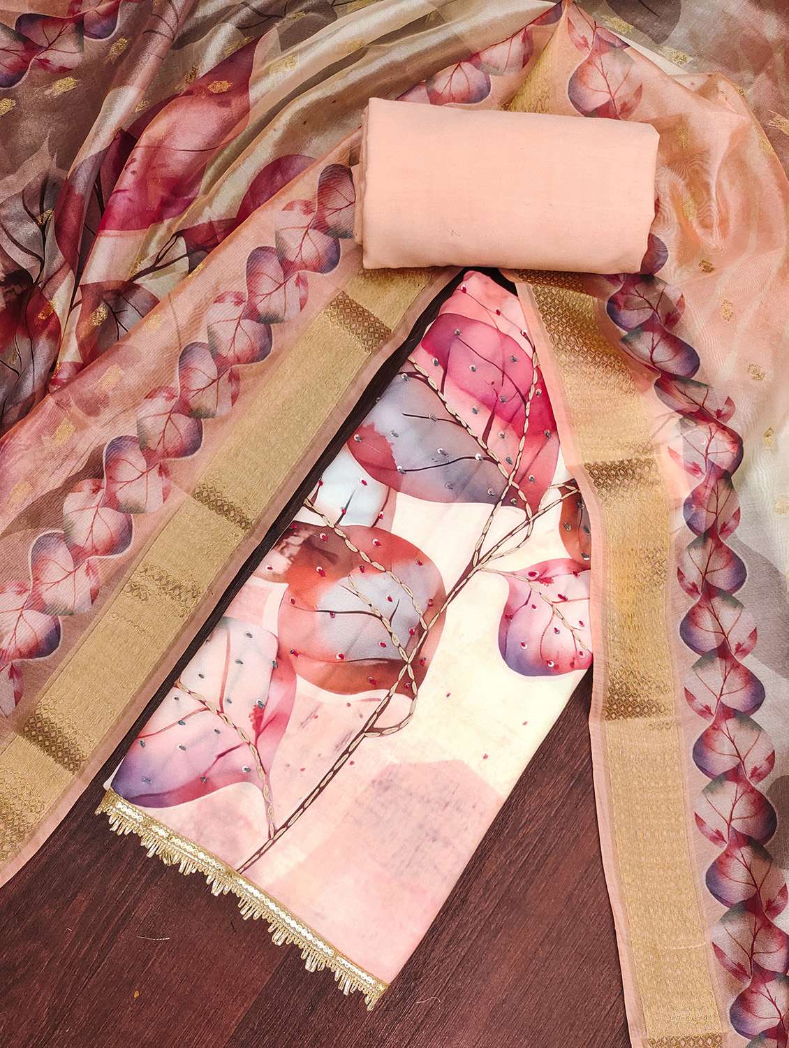 women printed unstitched suit set