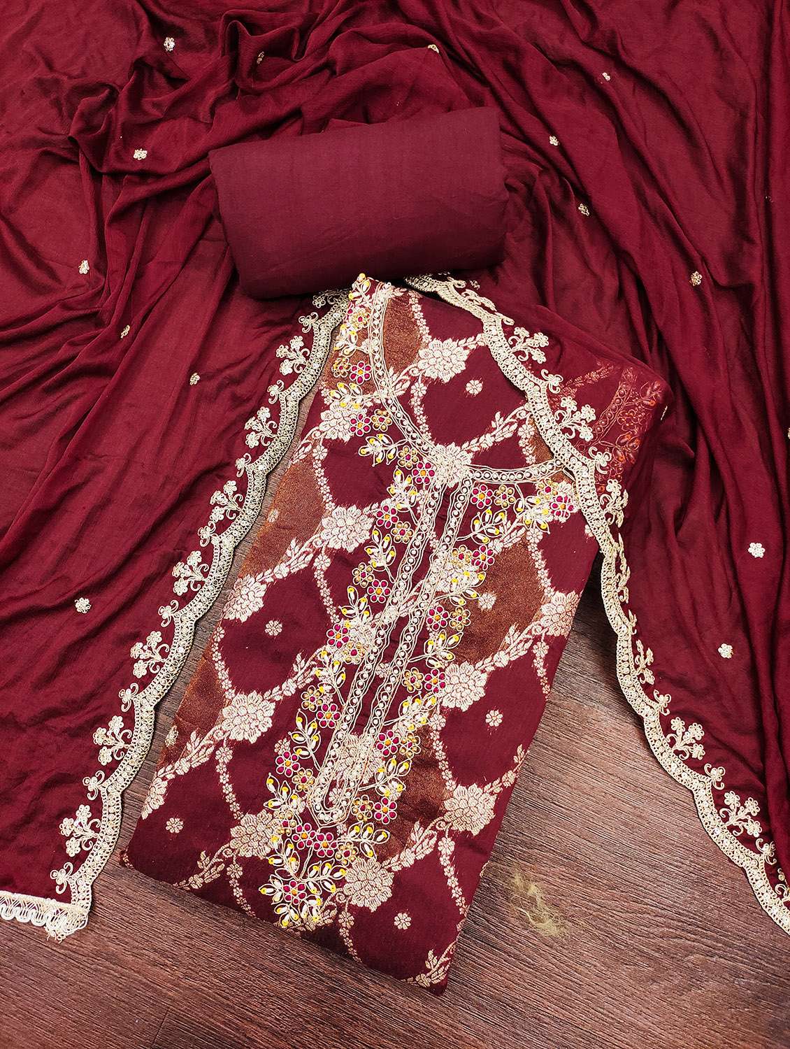 women self design unstitched suit set