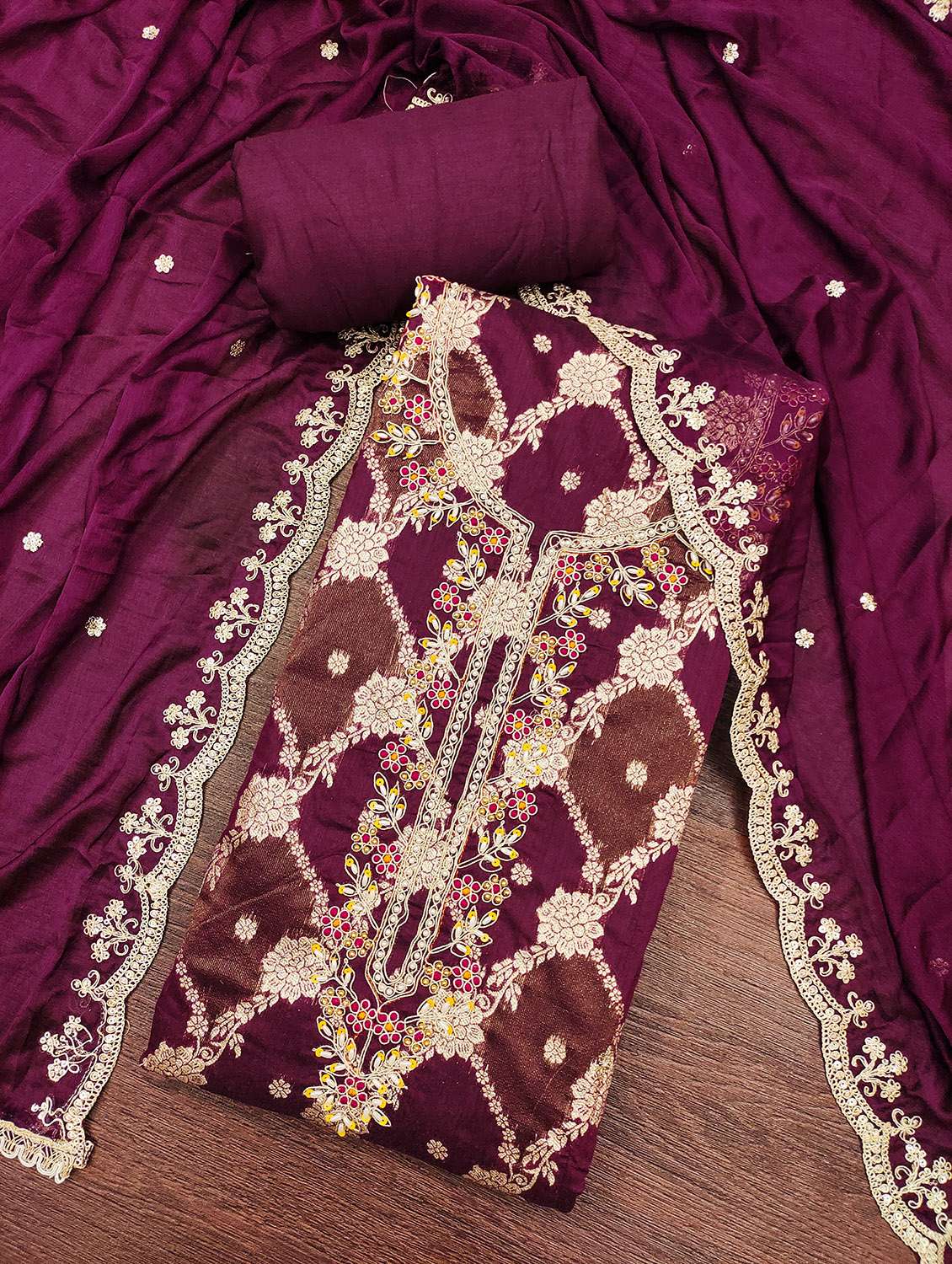 women self design unstitched suit set