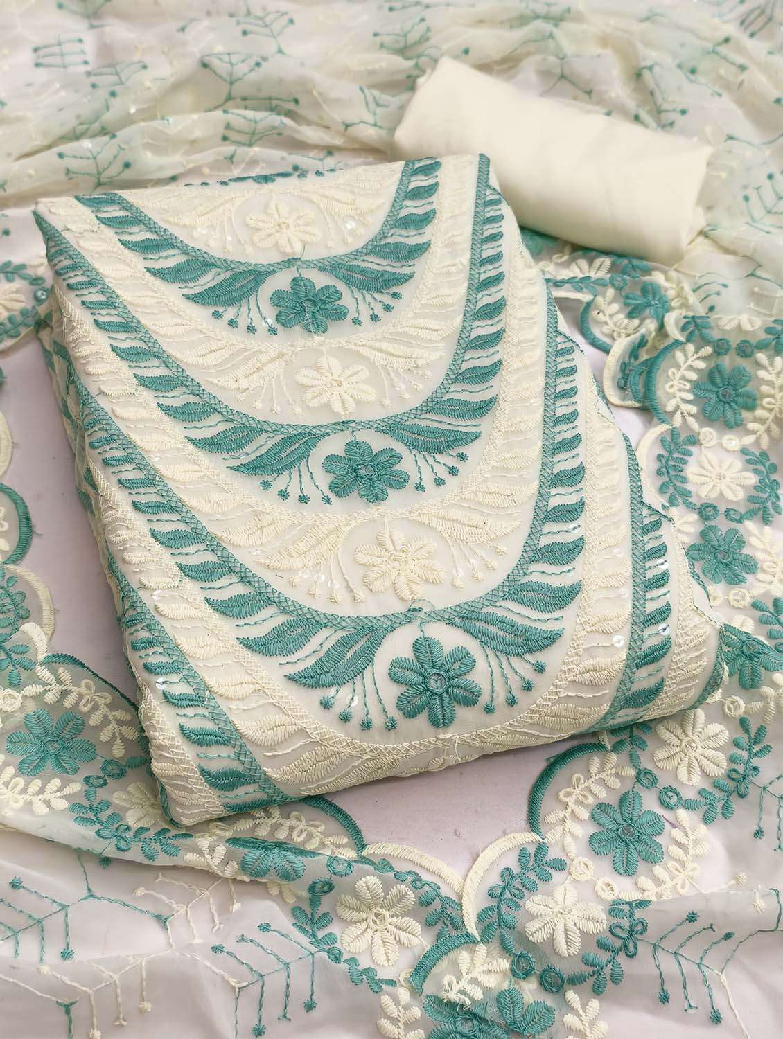 women solid with work unstitched suit set