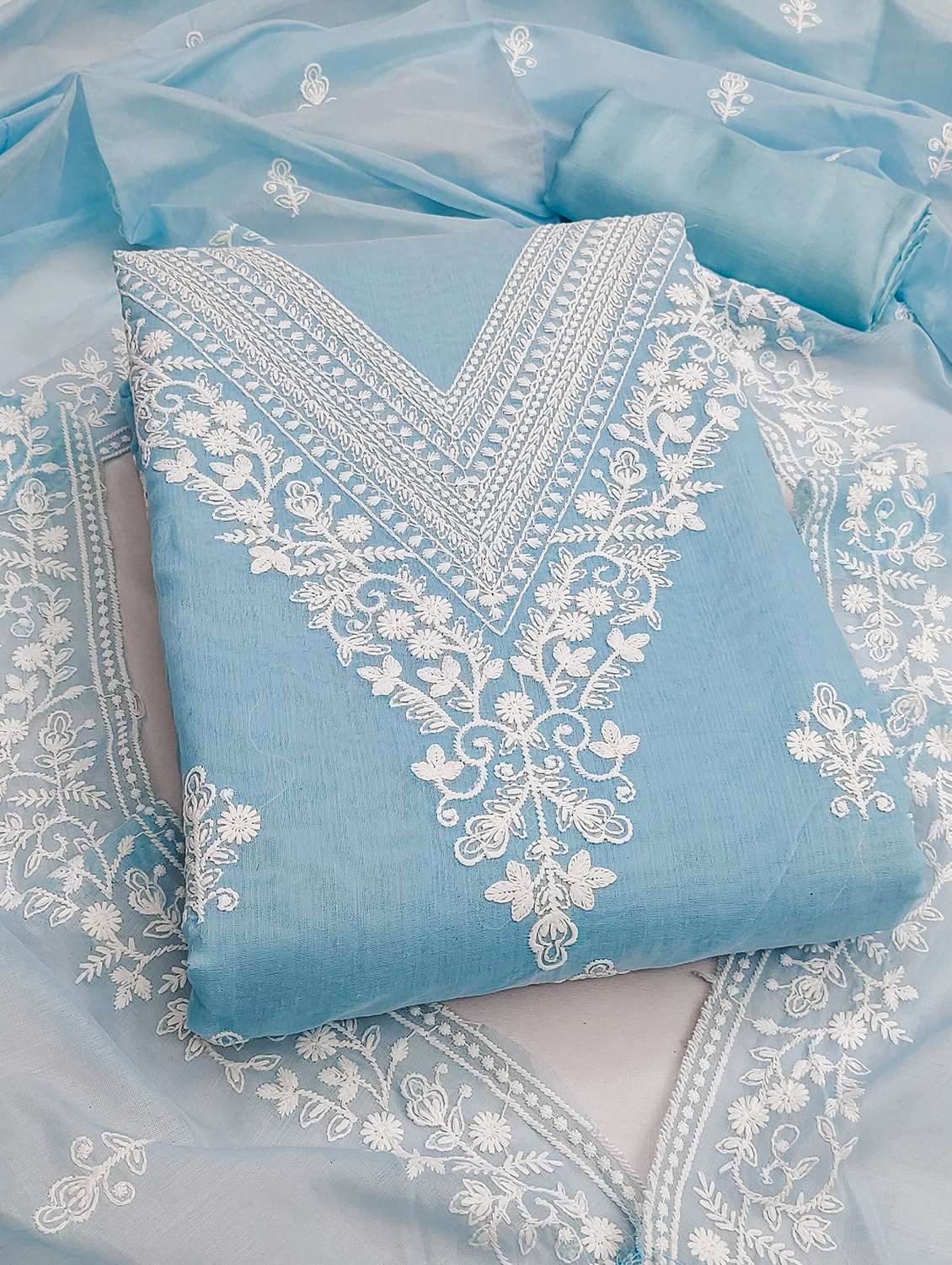 women solid with work unstitched suit set