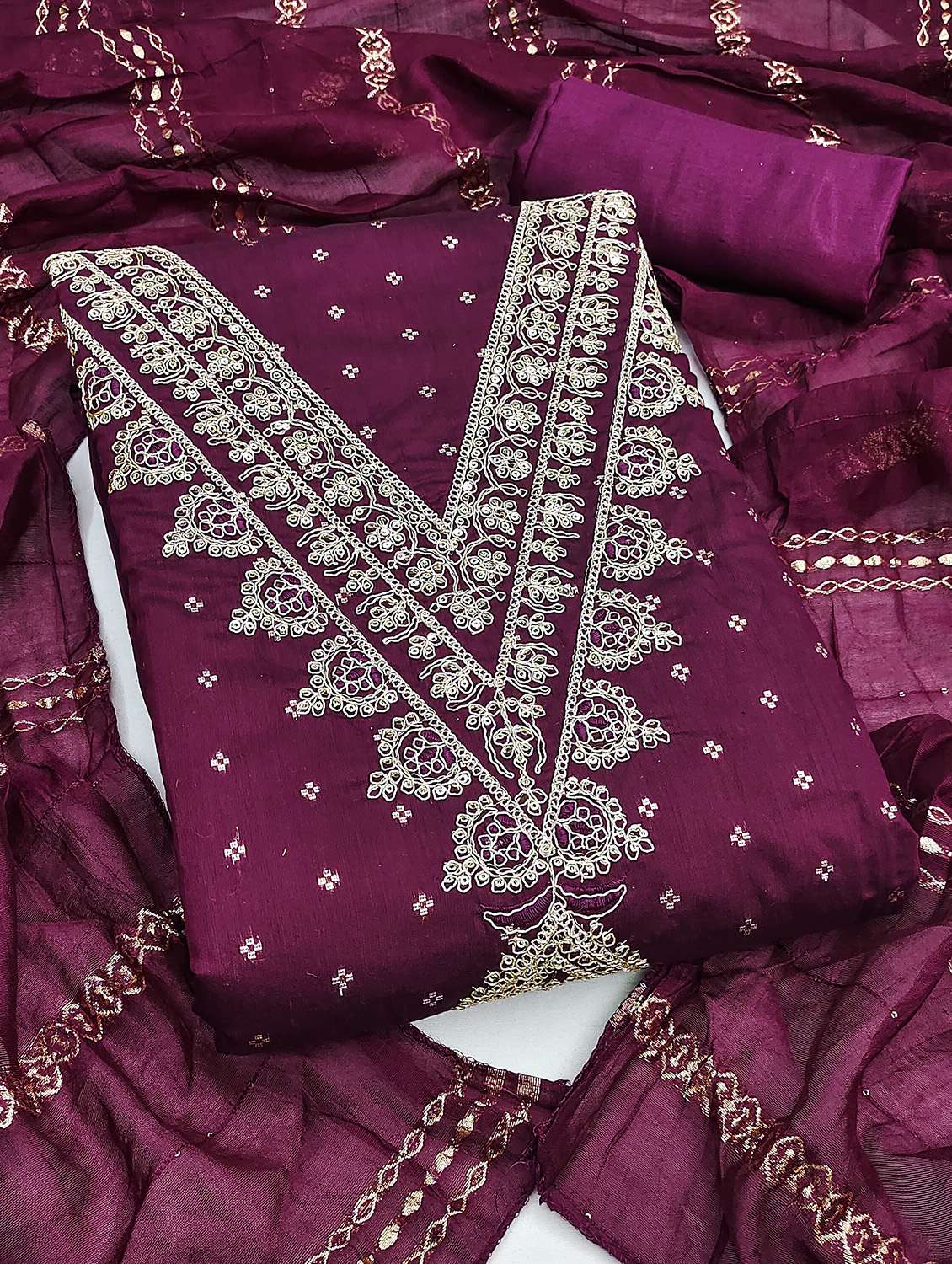 women self design unstitched suit set