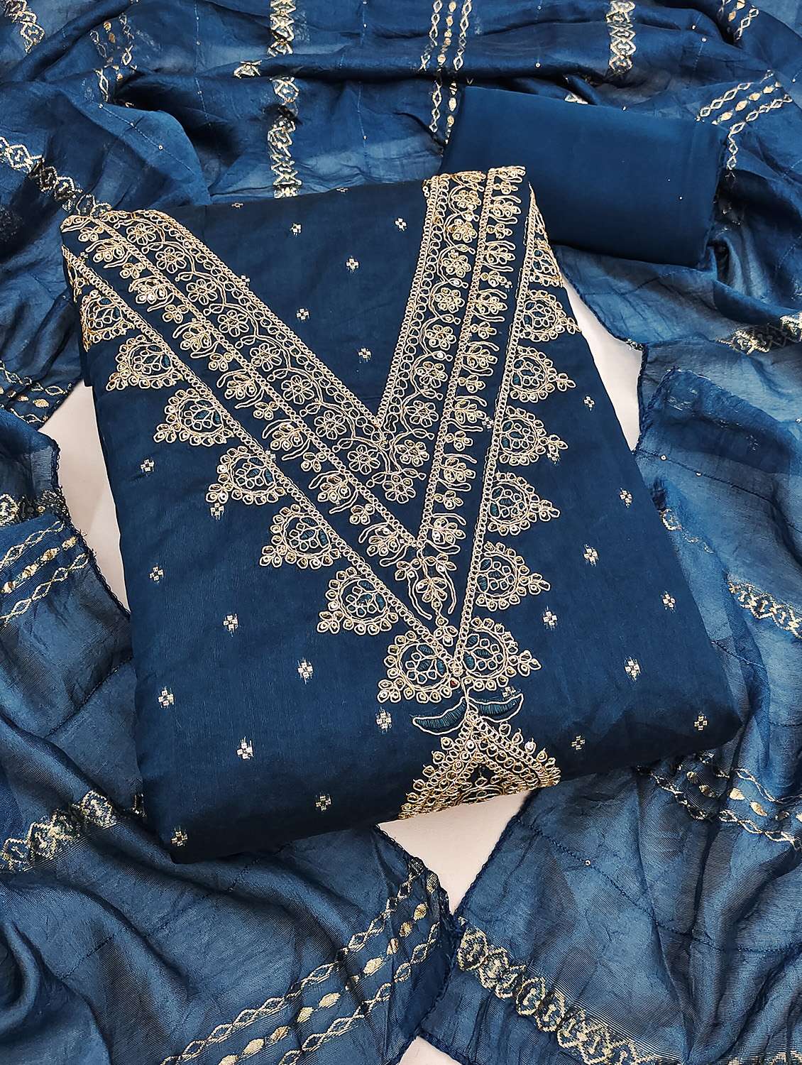 women self design unstitched suit set