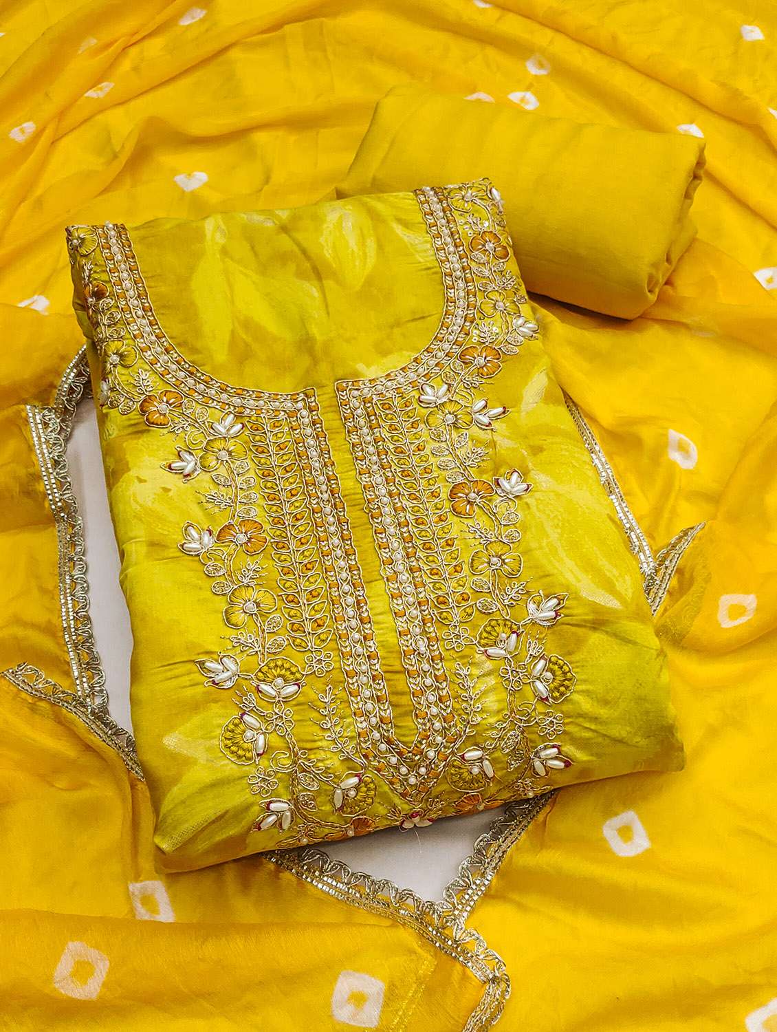 women printed unstitched suit set