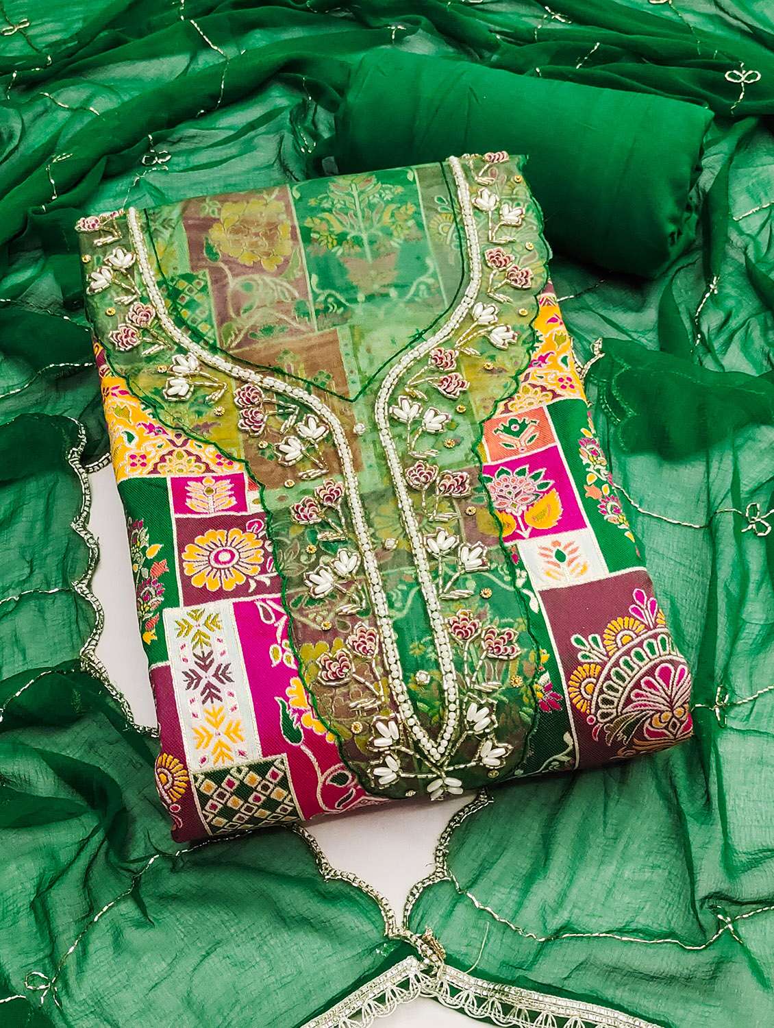 women self design unstitched suit set