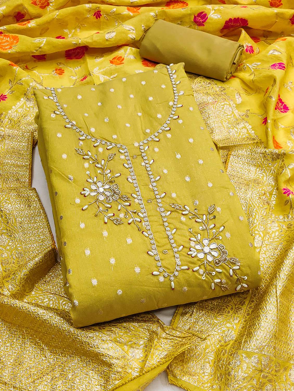 women self design unstitched suit set