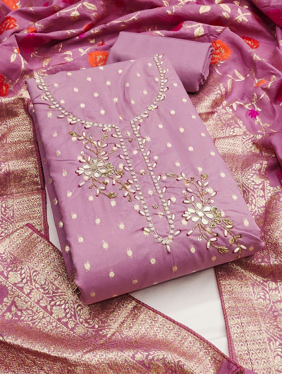 women self design unstitched suit set