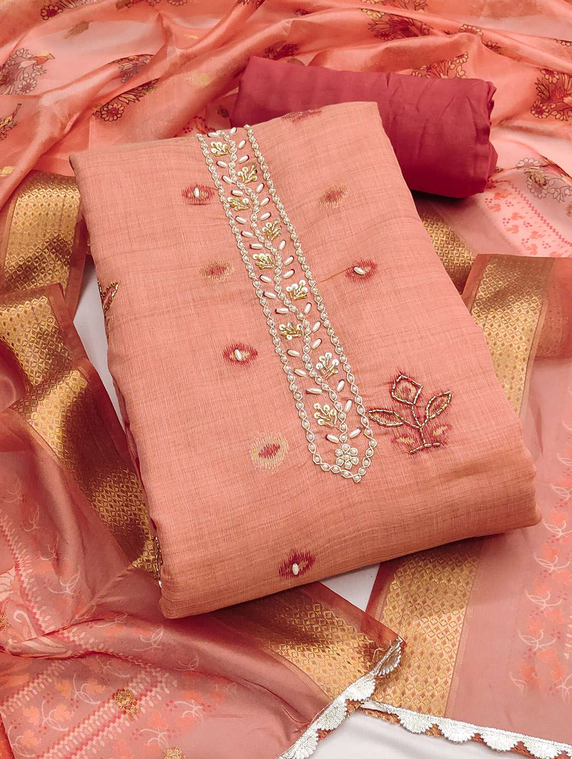 women self design unstitched suit set