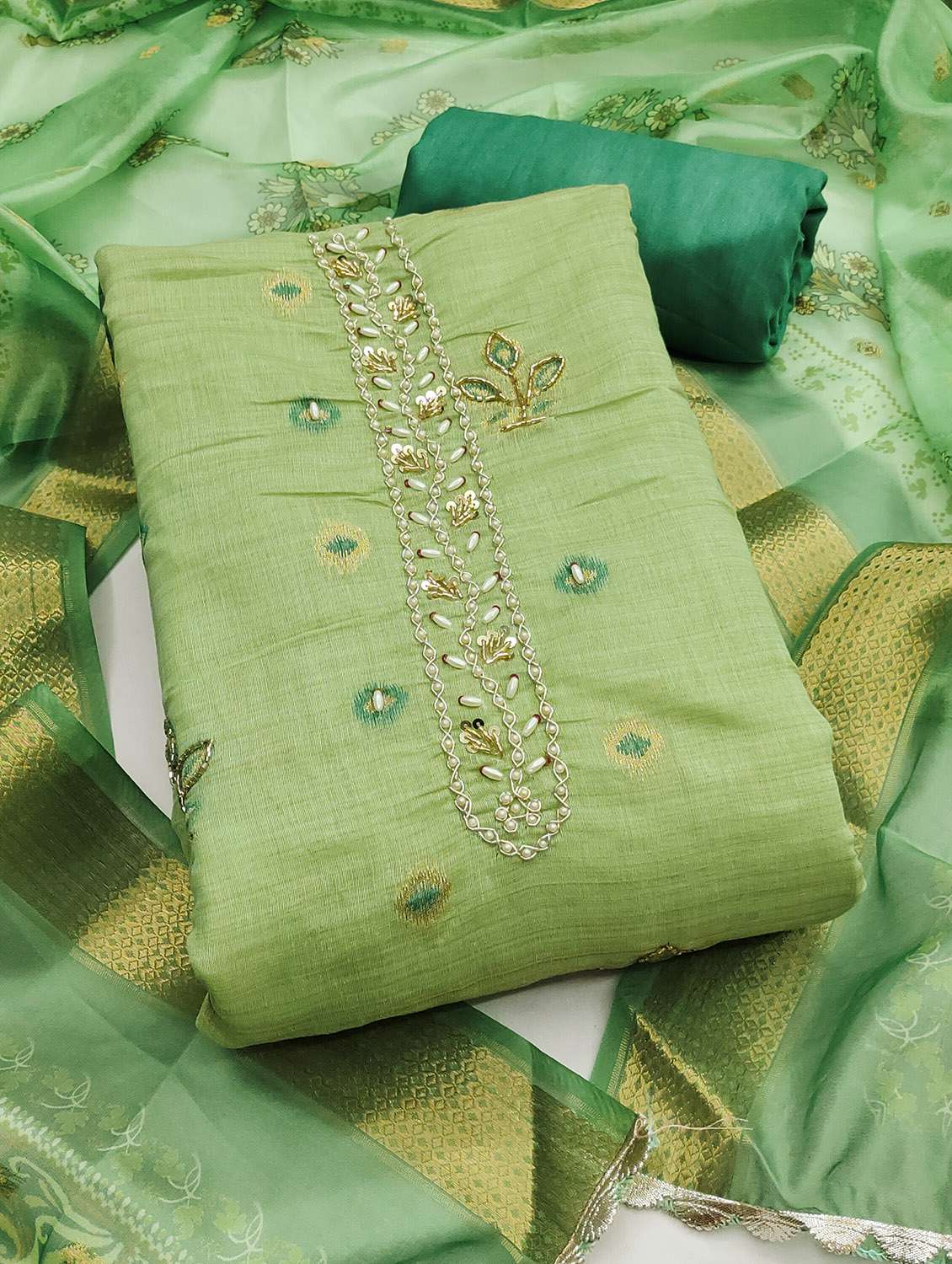 women self design unstitched suit set