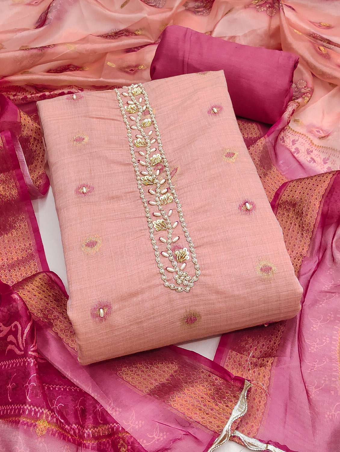 women self design unstitched suit set