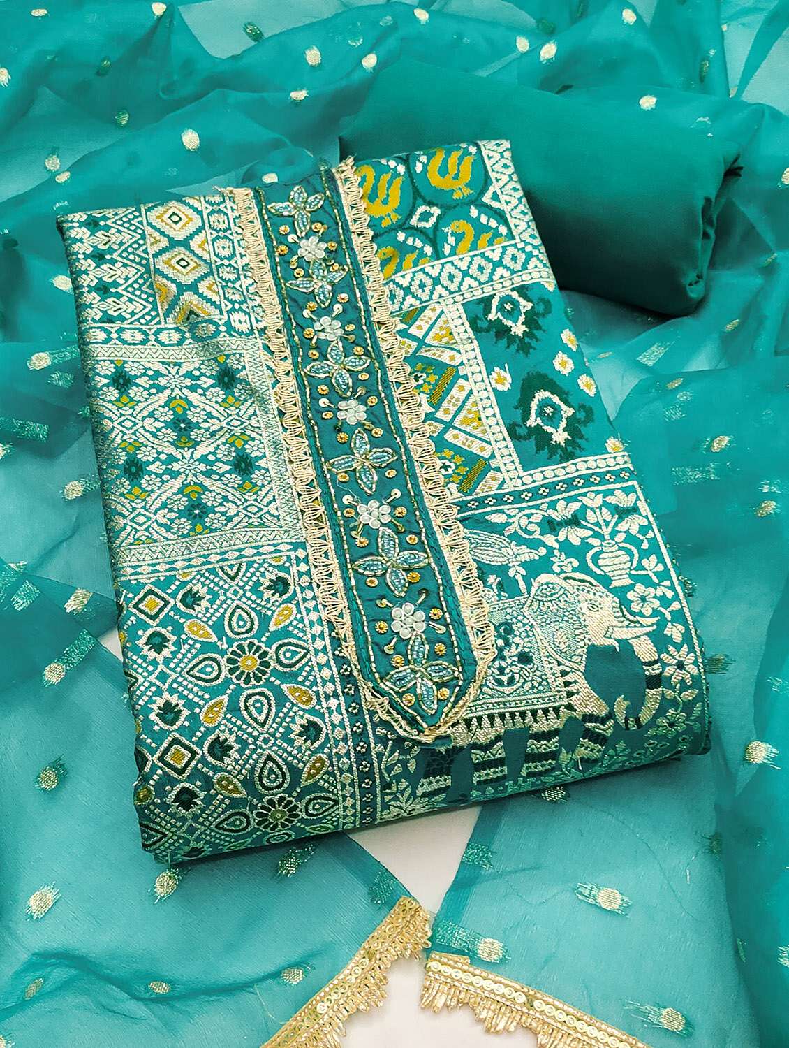 women self design unstitched suit set