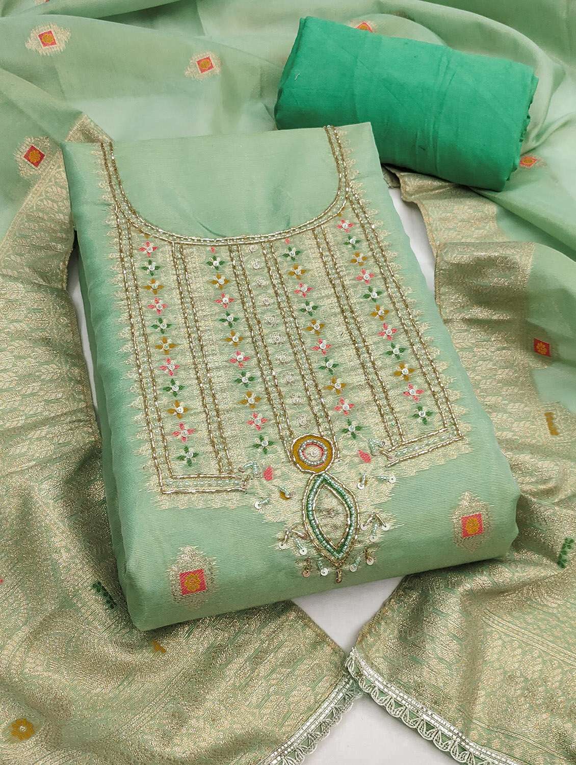 women self design unstitched suit set