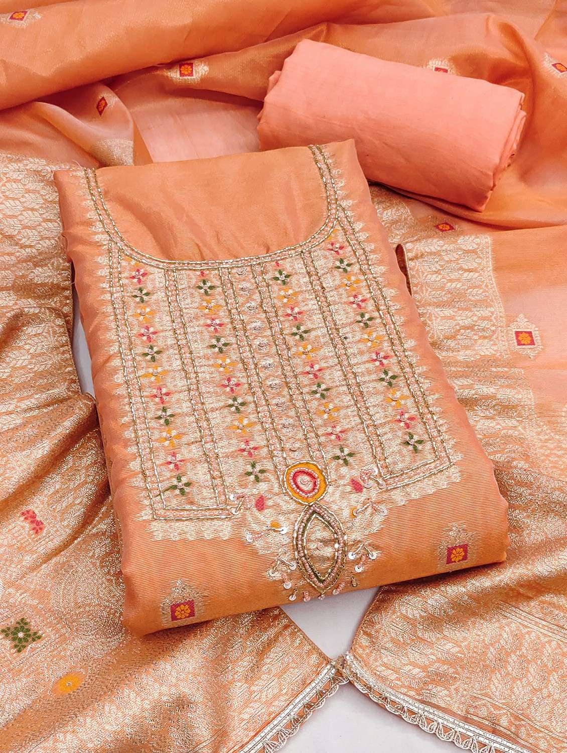 women self design unstitched suit set