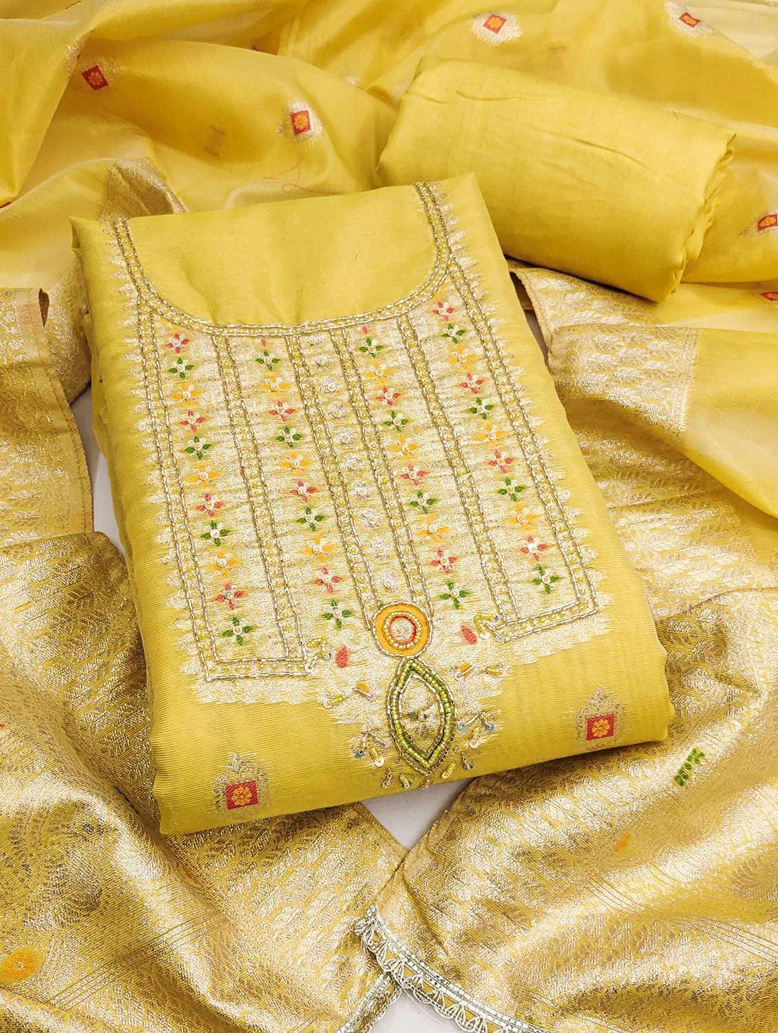 women self design unstitched suit set