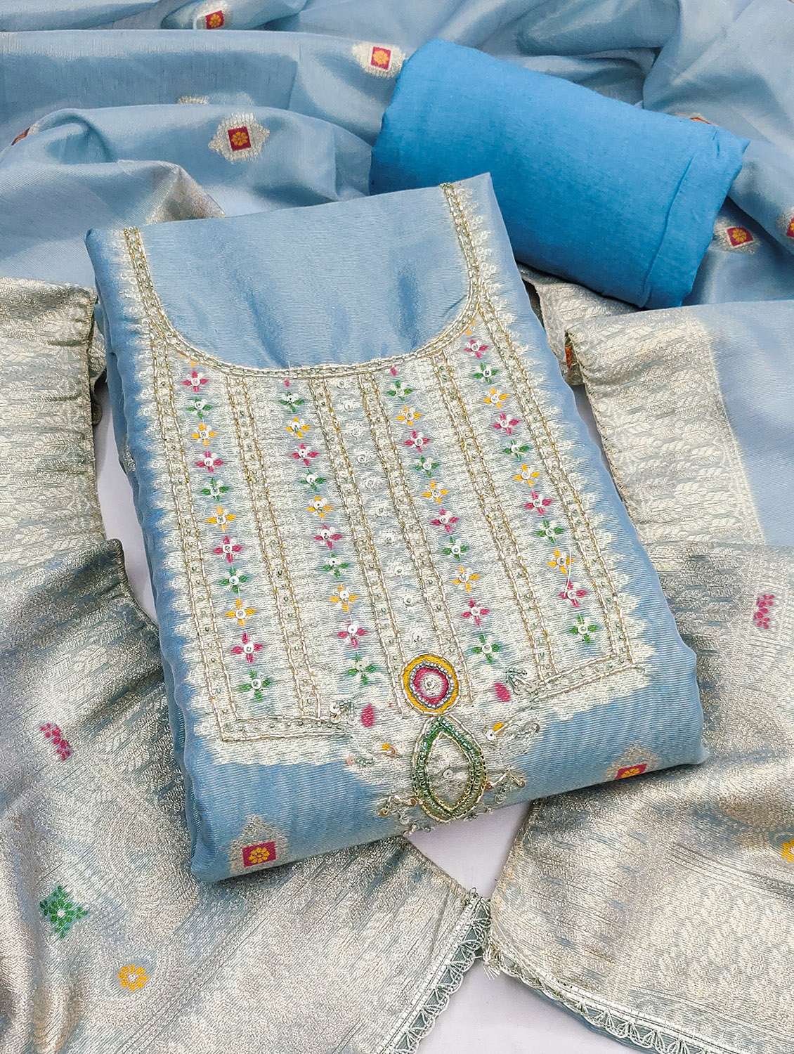 women self design unstitched suit set