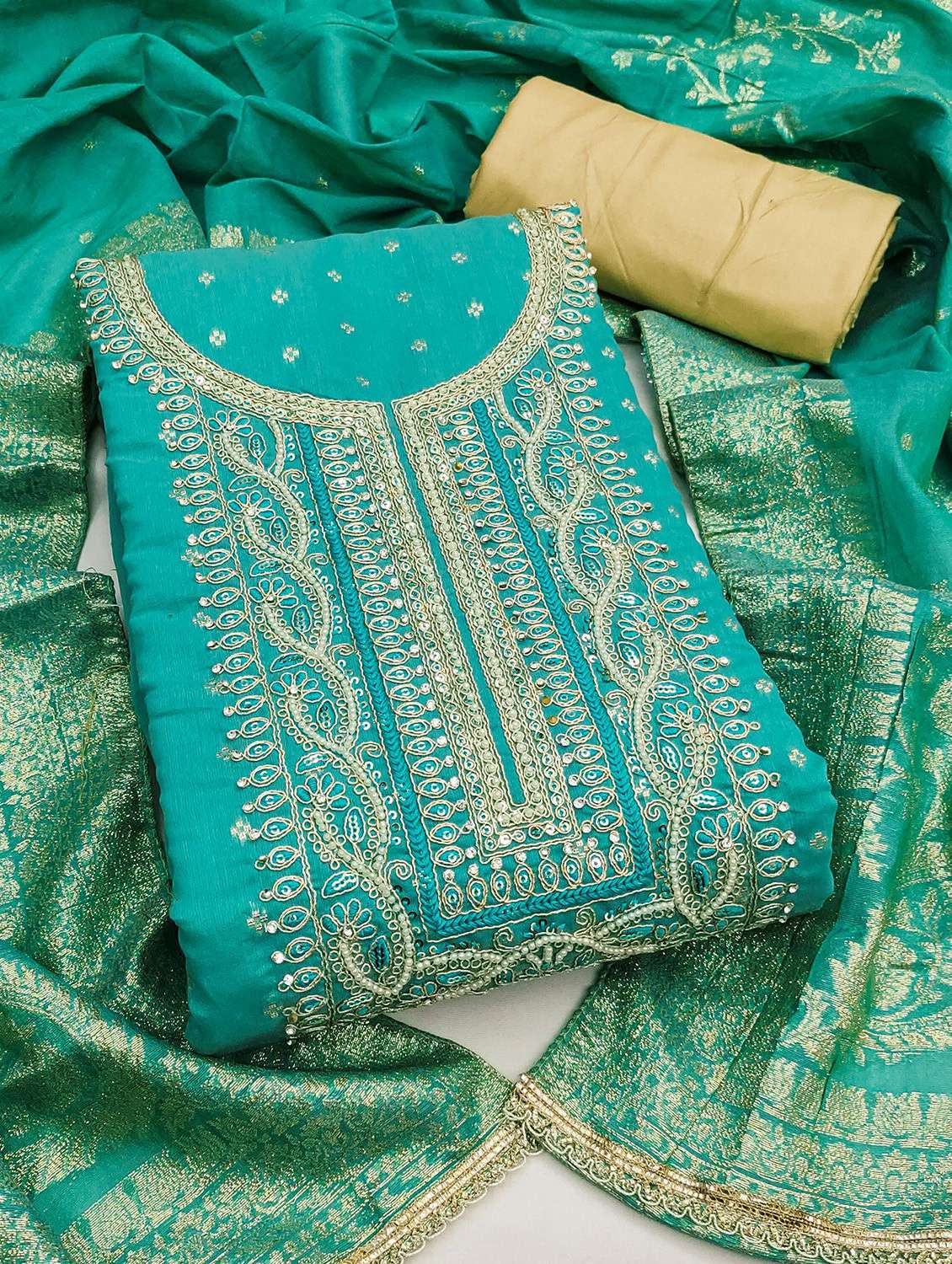 women self design unstitched suit set