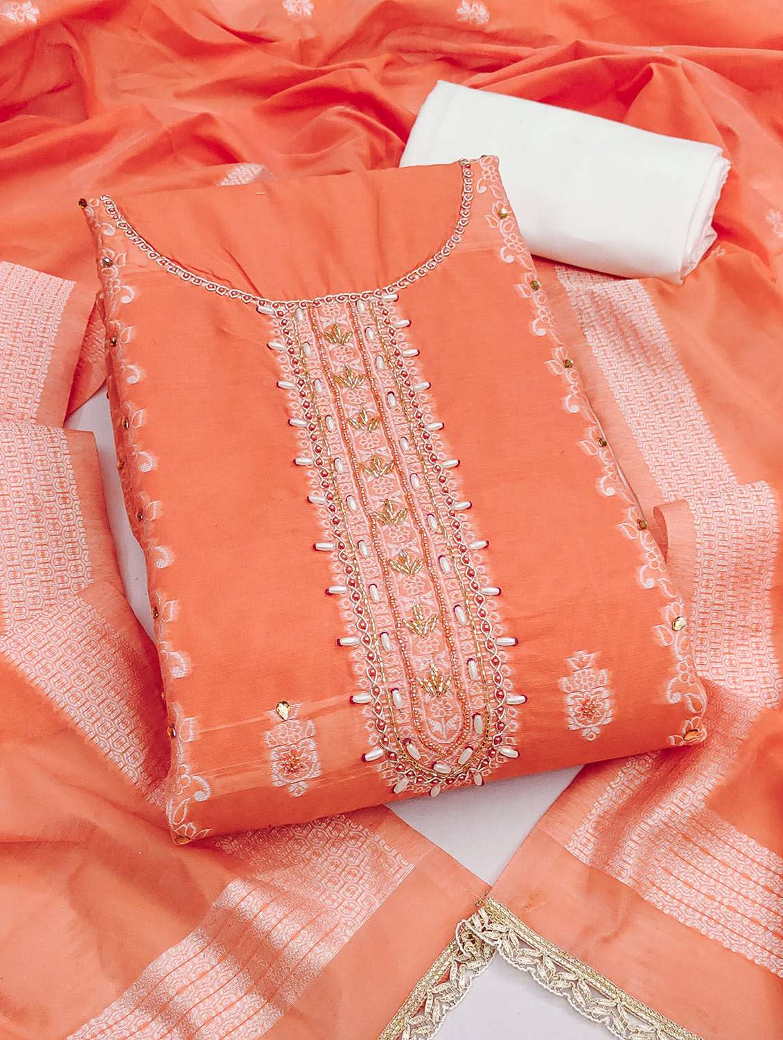 women self design unstitched suit set