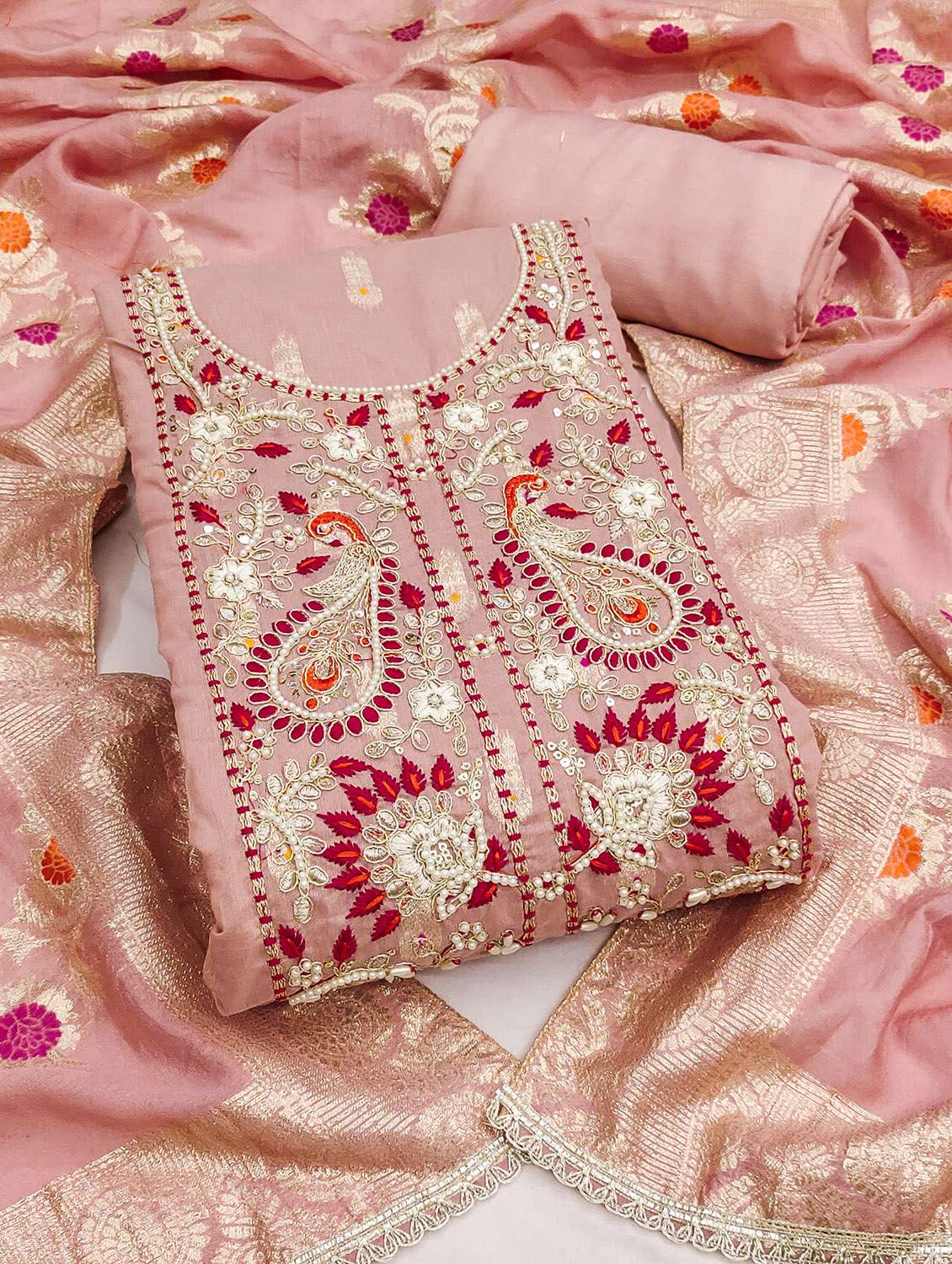 women self design unstitched suit set