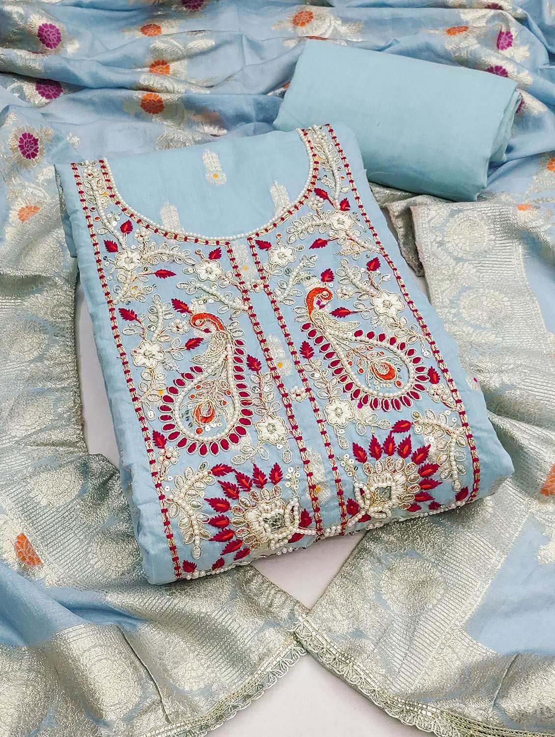 women self design unstitched suit set