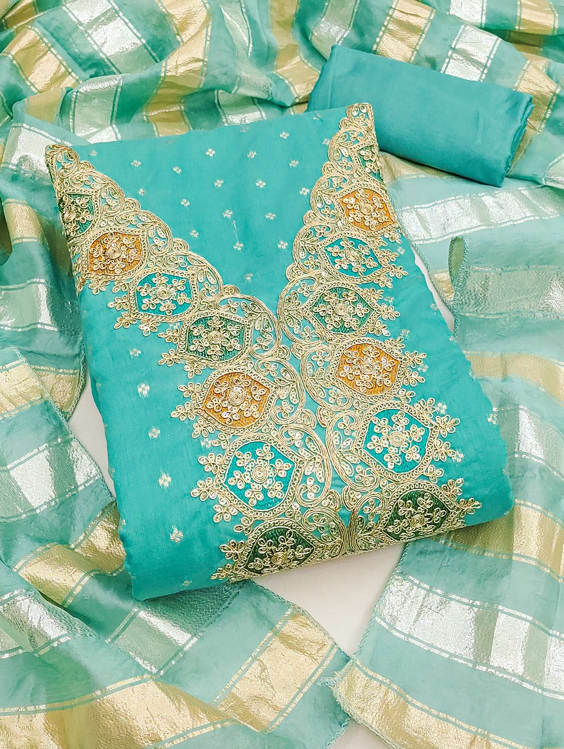 women self design unstitched suit set