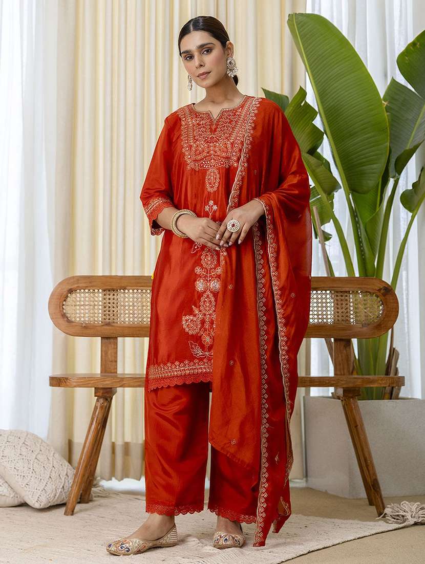 women orange kurta dupatta set
