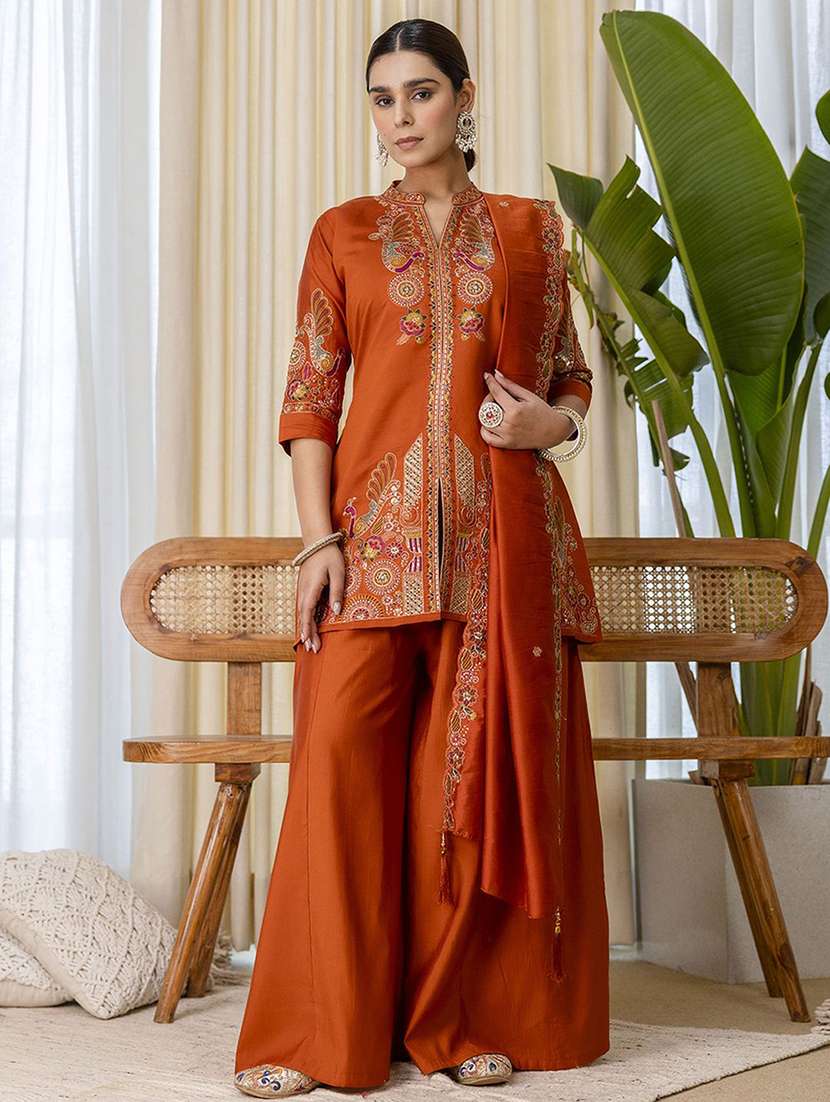 women self design orange kurta dupatta set