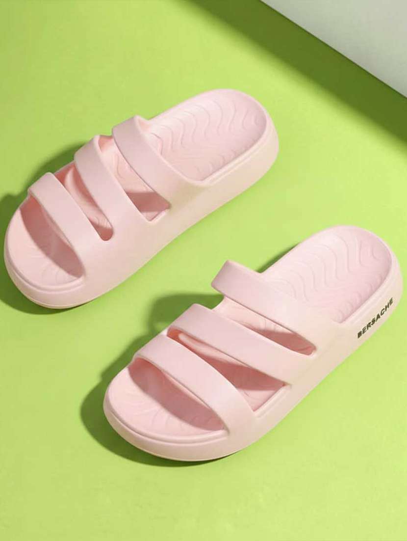 women pink color flip flops