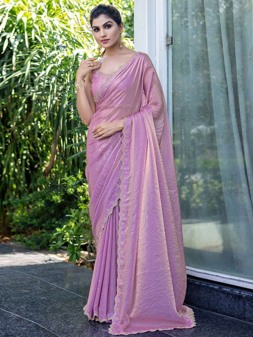 women solid with embellished bordered saree