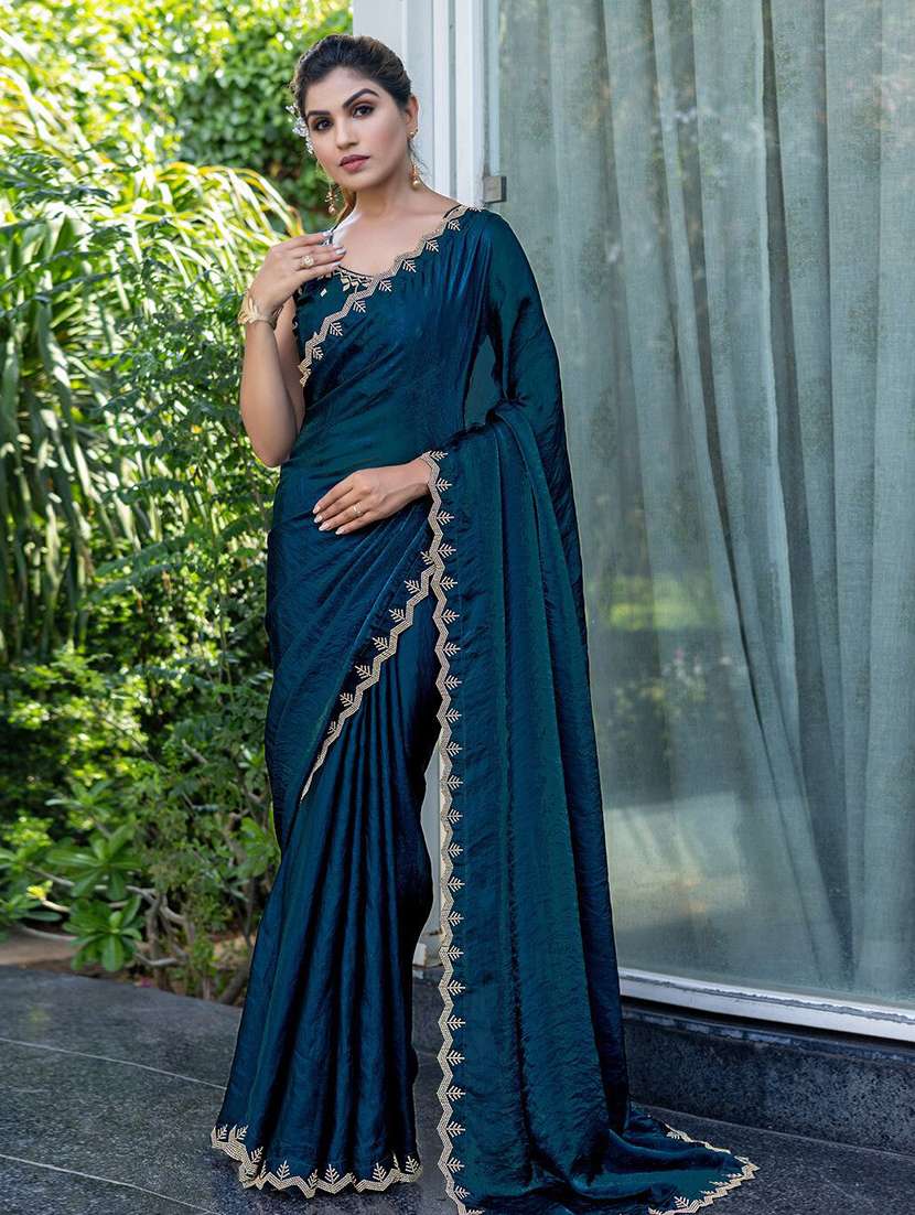 women solid with embellished bordered saree