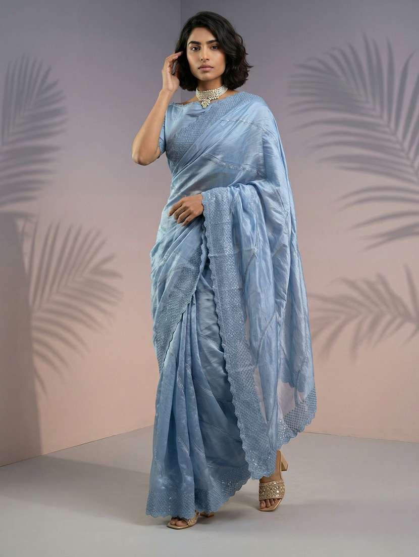 women solid with work embroidered saree with blouse