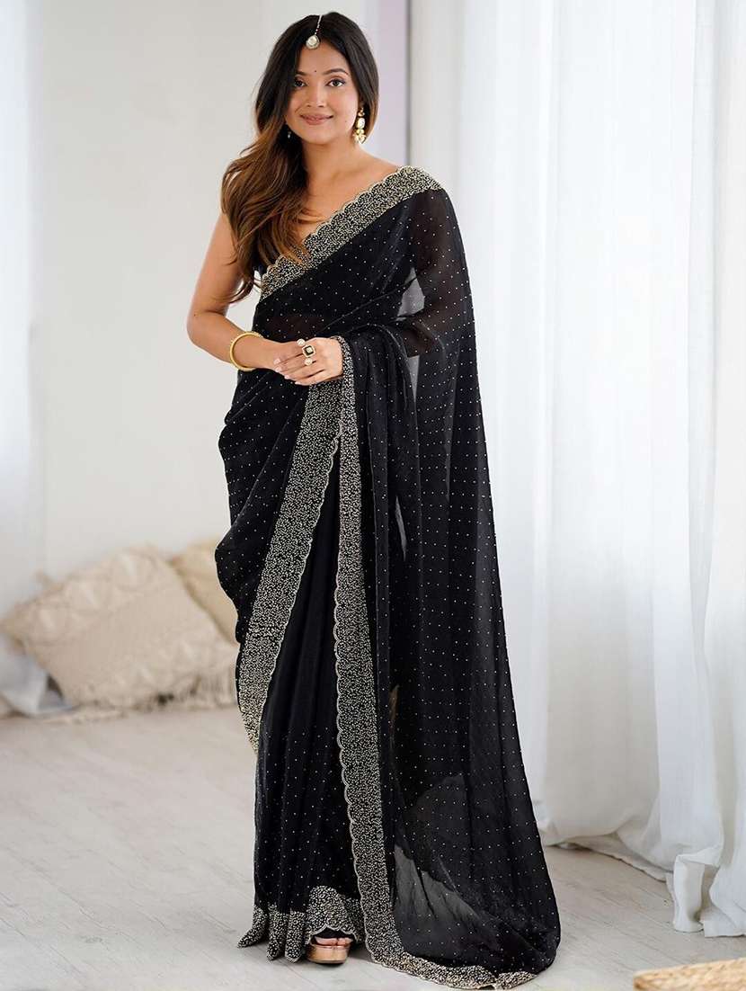 women solid with work embellished saree
