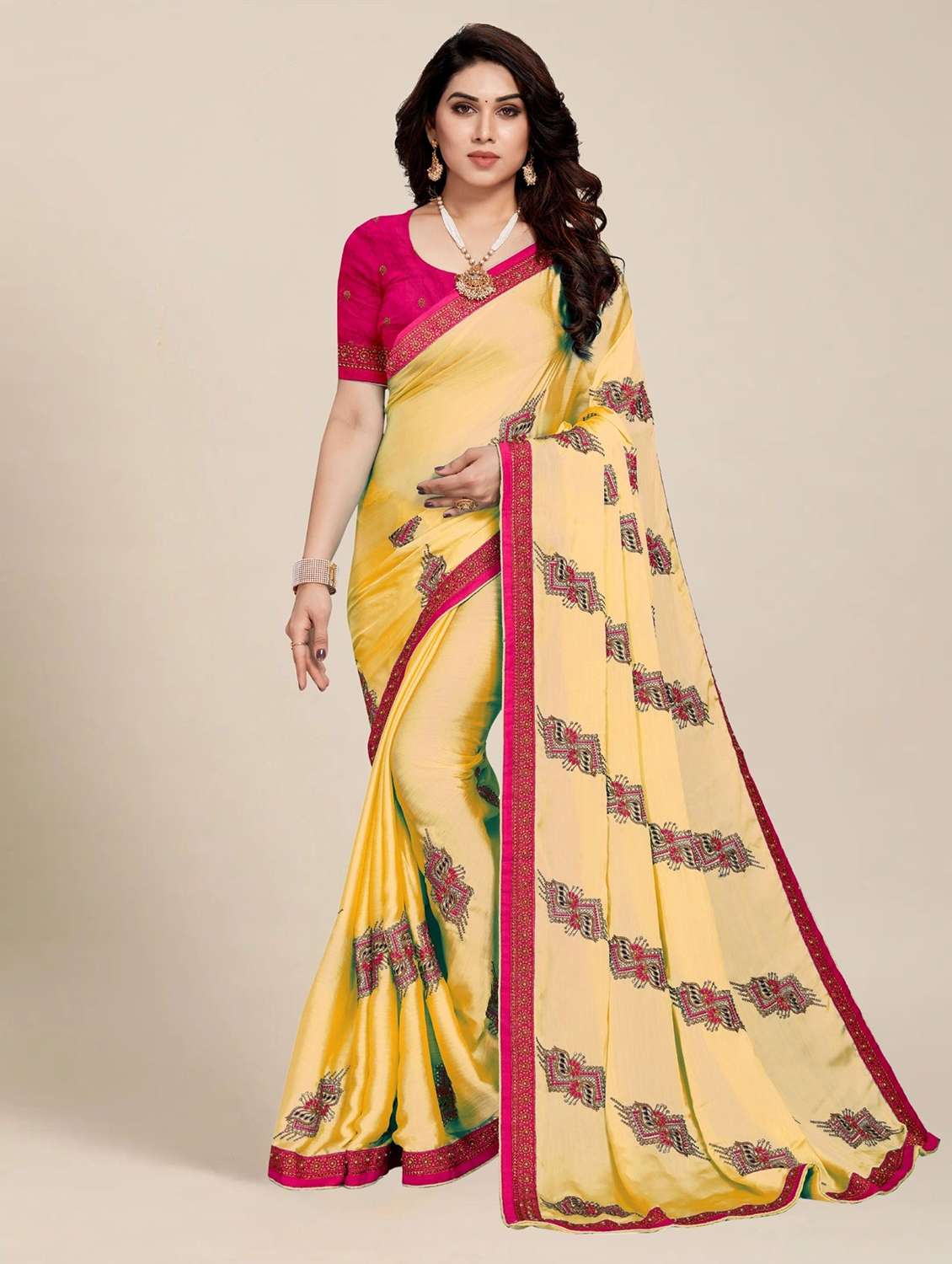 women solid with work embroidered saree
