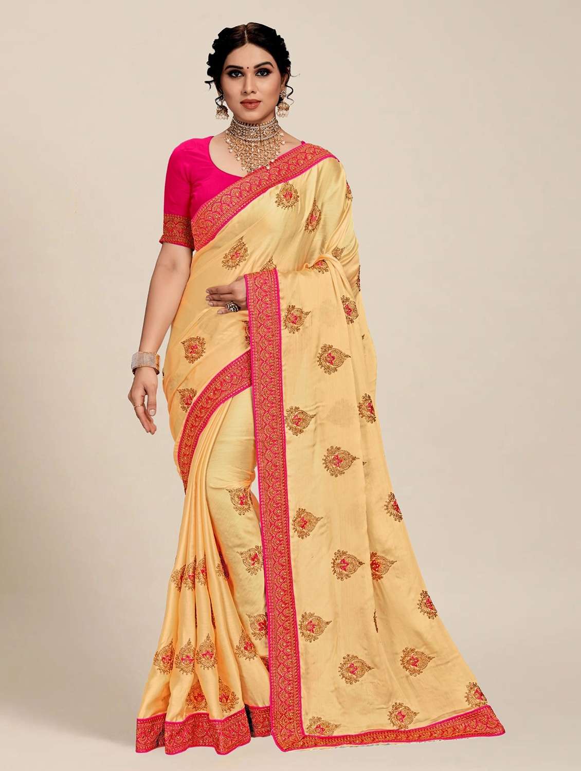 women solid with work embroidered saree